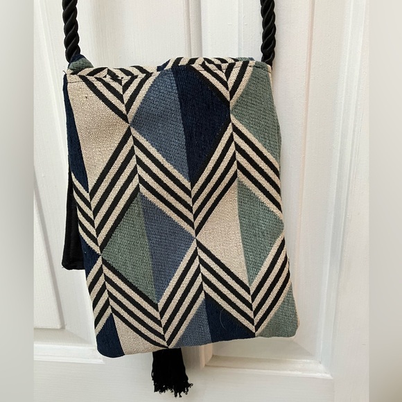 One of a kind fabric, clay, bead, tassel crossbody. Thick black braid-strap. - Picture 2 of 5